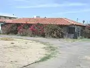 The Dr. Lowell Wormley House was built in 1949 and is located at 1910 E. Broadway Road. Dr. Lowell Wormley was born in Washington, D.C., and studied medicine at Howard University Medical School. When he arrived in Arizona in the mid-1940s, he was one of only three African-American doctors in Phoenix. He was on the staff of both St. Joseph's and Good Samaritan hospitals. He opened his own practice in 1946 in the Midtown Medical Building, 1 N. 12th St., and practiced there until the early 1980s. In 1949, he and his wife, Olivia, built this home on East Broadway Road. The house was listed in the Phoenix Historic Property Register in June 2005.