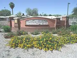 Entrance of where the historic Matthew Henson Public Housing Project  once stood. The Matthew Henson Public Housing Project was built in 1940 and provided affordable housing for the African-American community. The Matthew Henson Public Housing Project District is located on the west side of Seventh Avenue just south of the Sherman Street alignment. It was named as a historic district by the Phoenix Historic Property Register in June 2005.