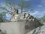 The chimney of the Rose Paulson House is the only thing that remains. The house was built in 1940 by Frank Lloyd Wright and was located on a hill by Camelback Road and Stanford Dr. The house caught fire in 1945 and what remains is the chimney that serves as part of the entrance to the Alta Vista Estates community.