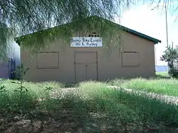 This historic building is the Santa Rita Center (also known as Santa Rita Hall).  It is located at 1017 E. Hadley Street between 10th Street and 10th Place. It was here where Arizona native Cesar Chavez, the hero of farm workers, began his 24-day hunger strike on May 11, 1972, to draw attention to the inhumane conditions farm workers endured in the fields. Coretta King met with Chavez in the hall during his fast. For a while, the hall was the headquarters of what became the United Farm Workers of America Union. The structure, which was built in 1962, was listed in the Phoenix Historic Property Register in October 2007.