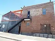 The two-story Southwest Cotton Co./Karlson Machine Works building was built in 1918 and is located at 104 E. Grant Street. Designated as a landmark with Historic Preservation-Landmark (HP-L) overlay zoning. Listed in the Phoenix Historic Property Register.