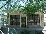 This historic building once housed "Peoples Drug Store". This structure was built c. 1940s and was originally located at 111 East Dunlap Avenue. Pharmacist Bob Rice established his pharmacy there and in 1953 installed what was the first pharmacy drive through window in Arizona and the fifth in all the nation. The building was moved in 1999, to 737 E. Hatcher Road, Phoenix its current location and currently is the home of the Sunnyslope Historical Society and Museum.