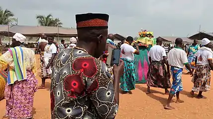 Procession and a photographer.