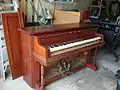 Piano case reed organ