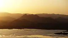 Sunset at Pichola lake, seen from Karni Mata Temple