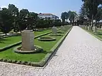 The larger building on the left is the mansion, and the shrine is on the right