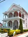 A house in the Cape May Historic District with elaborate gingerbread trims