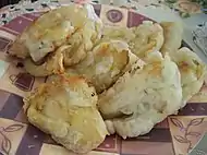 Pisang goreng with paler batter.