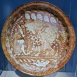 Lustreware plate painted by Abu Zaid al Kashani in December 1210 (AH 607), under the Khwarazmian Empire. Freer Gallery of Art.