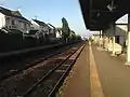 A view of the station platforms and tracks looking in the direction of Nata.