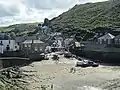 The rear of the pub (left) and its view of the harbour