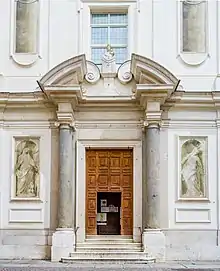 Portal and frescos by Enrico Albrici of the Santa Maria della Carità church in Brescia.