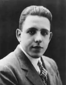 head and shoulder shot of young man looking towards the camera