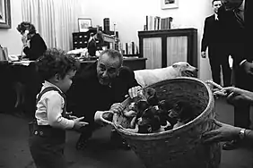 Image 53President Lyndon B. Johnson with a basket of puppies in 1966 (from Puppy)