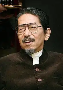 Picture of a man with goatee wearing glasses