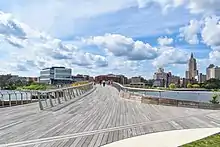 The Michael S. Van Leesten Memorial Bridge connects the neighborhood to the city's East Side