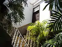 Access to the house from the right door of the interior patio.