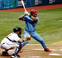 Albert Pujols, wearing the Cardinals' alternate powder-blue uniform, prepares to swing