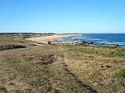 The resort and the beach of Punta Negra seen from the homonymous peninsula.