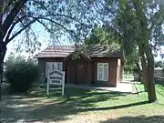 Historic Cartwright Heritage House, one of the buildings listed in the NRHP in 1993, which housed Mr. Glenn L. Downs in 1923. Downs was the first superintendent of the Cartwright School Dist