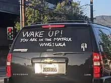 QAnon slogan "WWG1WGA" painted on an SUV