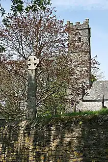 Cross to south of Church of St Hugo