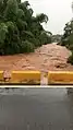 Río Culebrinas from bridge between Magos barrio and Calabazas barrio after heavy rains