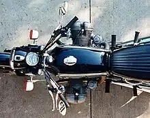 Top-down view of a black R75/5 showing that the cylinders which protrude out of each side of the bike are not directly opposite each other