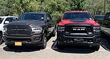 Ram 3500 next to Ram 2500 Power Wagon, showing the distinctive grill and winch for the Power Wagon