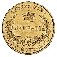 Gold coin showing a wreath enclosing AUSTRALIA