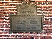 The commemorative plaque at the high school.