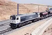 Standard gauge 319.2 in AVE livery (construction train)