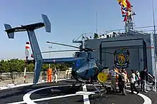 ROCN Hughes 500 "6910" carried on Lan Yang (FFG-935) helicopter deck from rear right view