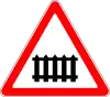 Level crossing ahead with barriers