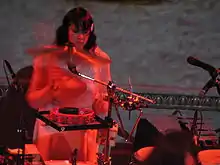 Rachel Blumberg playing drums for Bright Eyes