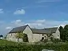 Hof Meurisse: walls, roofs, and cobblestone courtyard