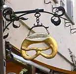 Bakery emblem with a cut in the pretzel, Ravensburg, Germany