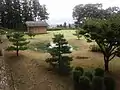 Reconstructed pond and small building of Hachigata castle