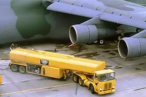 Tank truck aircraft refueler.