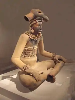 A large terracotta figurine of a young chieftain in the Remojadas style. 300–600 CE; Height: 31 in (79 cm).