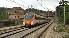 A Civia 465 with the Rodalies de Catalunya livery in Els Comtals, Catalonia