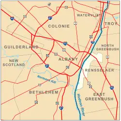 Map shows Albany on the west bank of the Hudson, surrounded by the towns of Colonie, Guilderland, and Bethlehem. Roads are also shown. Interstates 90, 87, and 787 pass through the city boundaries.