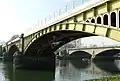 Richmond Railway Bridge looking downstream with Twickenham Bridge in the background