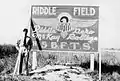 Flying cadet at airfield sign