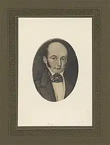 Facial portrait of light-skinned man, balding, with dark hair and side-burns, mid-19th century jacket and dark bowtie