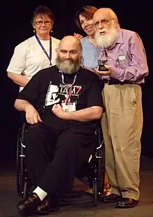 Robert S. Lancaster with family and James Randi receiving the Citizen Skeptic Award, July 11, 2009