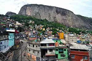 Houses in front of rocky outcrop