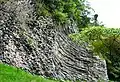 A cliff of rocks is a popular climbing opportunity