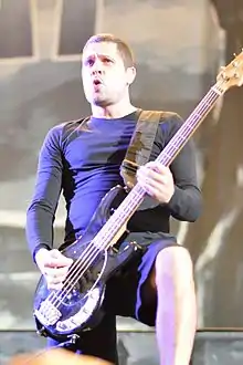 Kjølholm performing with Volbeat in 2013