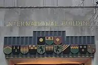 Lintel depicting fictional shields above the entrance at 20 West 51st Street